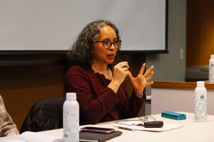 Gina Pérez speaks to a student body crowd. 